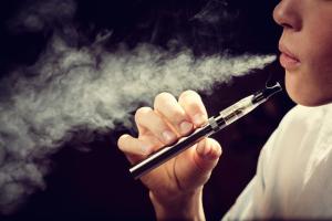 A teen vaping